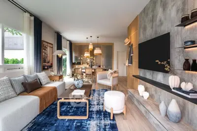 Luxurious modern living room with stylish decor and open layout, perfect for entertaining.