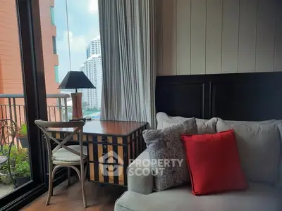 Cozy living room with city view and stylish decor