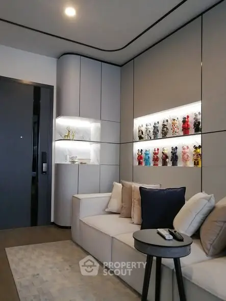 Modern living room with stylish decor and built-in display shelves