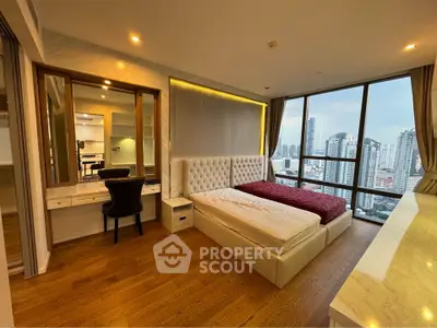 Luxurious bedroom with stunning city view and elegant furnishings