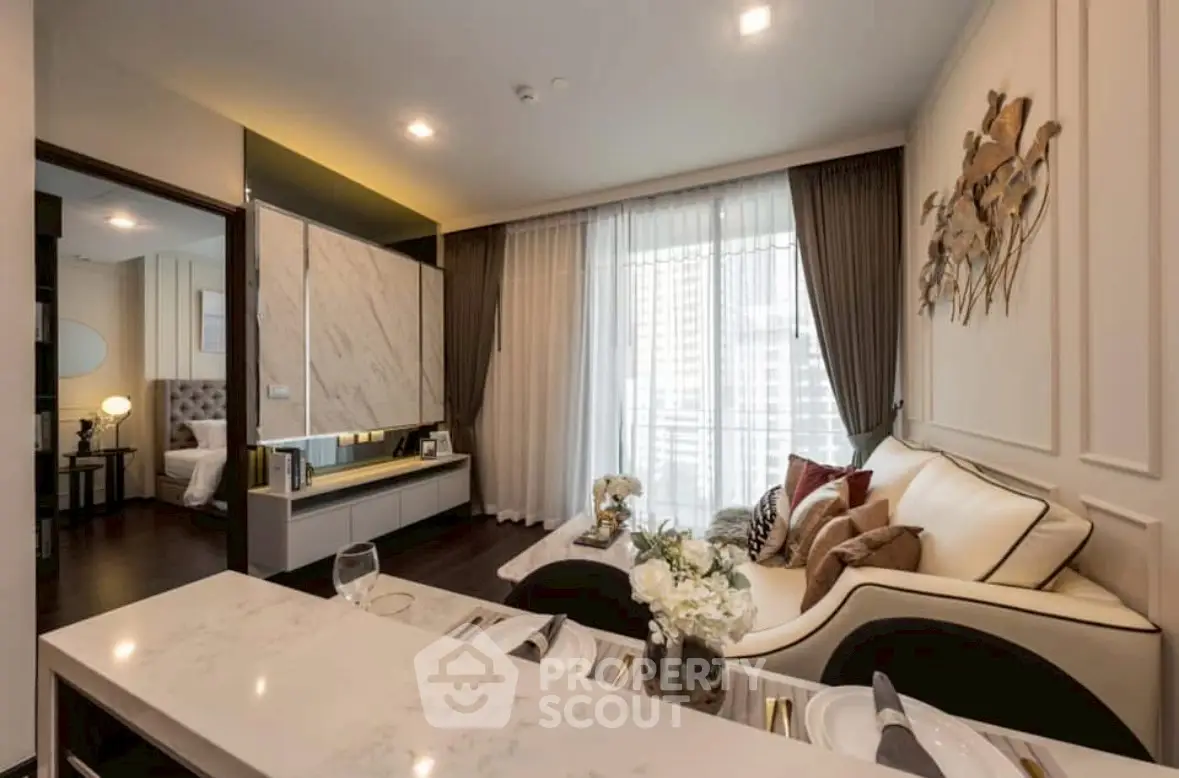 Luxurious modern living room with elegant decor and open layout, featuring a cozy seating area and stylish dining space.