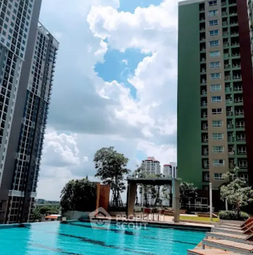 Luxurious high-rise apartment with stunning pool and skyline view