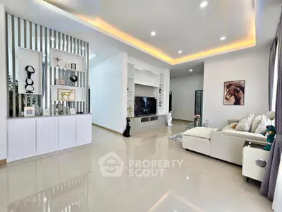 Spacious modern living room with elegant decor and ambient lighting