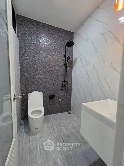 Modern bathroom with sleek fixtures and stylish tile design