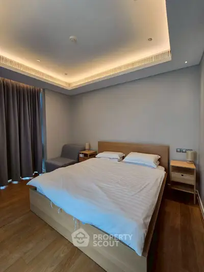 Modern bedroom with cozy lighting and minimalist design