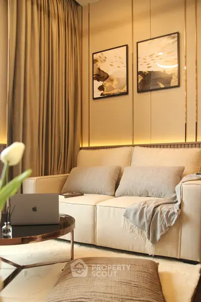 Elegant living room with cozy beige sofa and modern decor