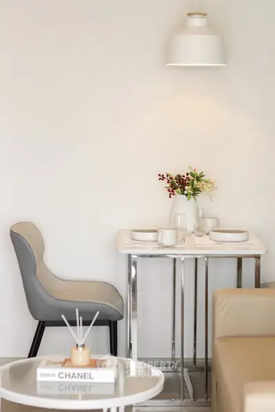 Modern dining area with elegant table setting and stylish decor