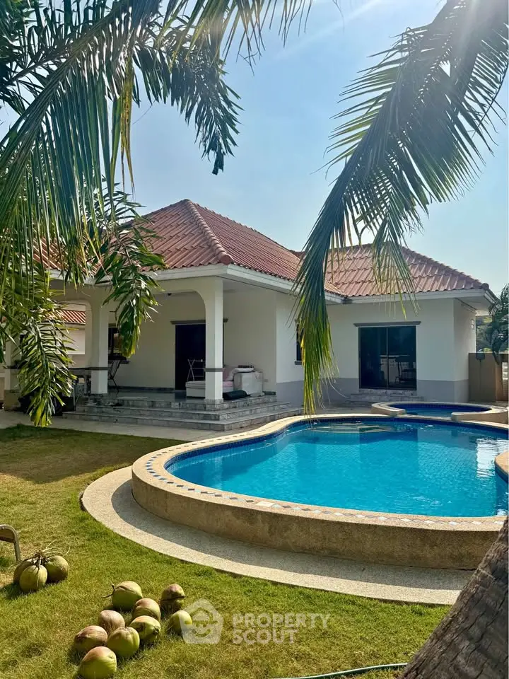 Charming villa with private pool and lush garden, perfect for tropical living.