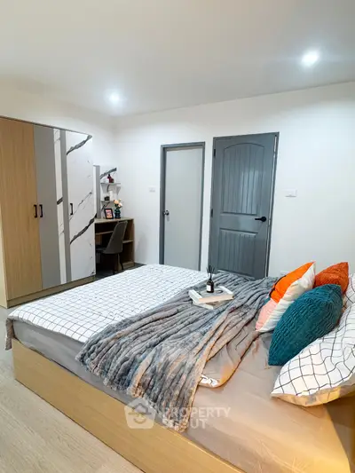 Cozy bedroom with modern decor and stylish furniture