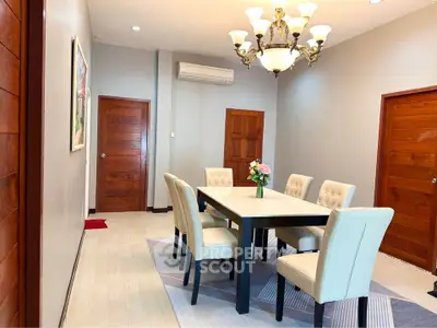 Elegant dining room with chandelier and modern decor