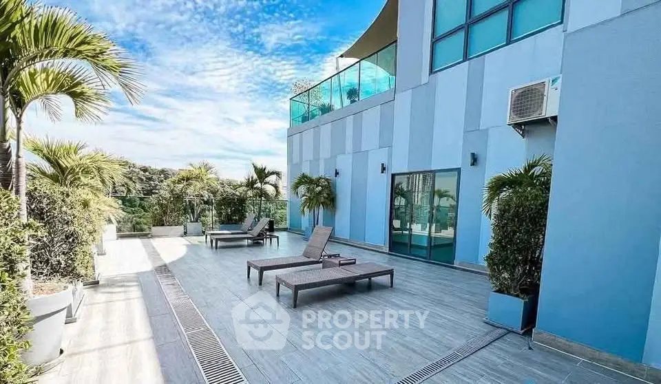 Luxurious rooftop terrace with modern design and stunning views, perfect for relaxation and entertainment.