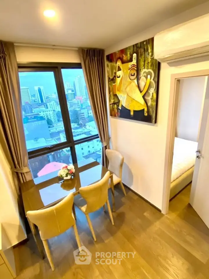 Stylish dining area with city view in modern apartment