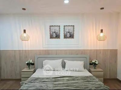 Elegant bedroom with modern lighting and cozy decor, perfect for relaxation.