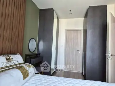 Modern bedroom with stylish decor and ample storage space