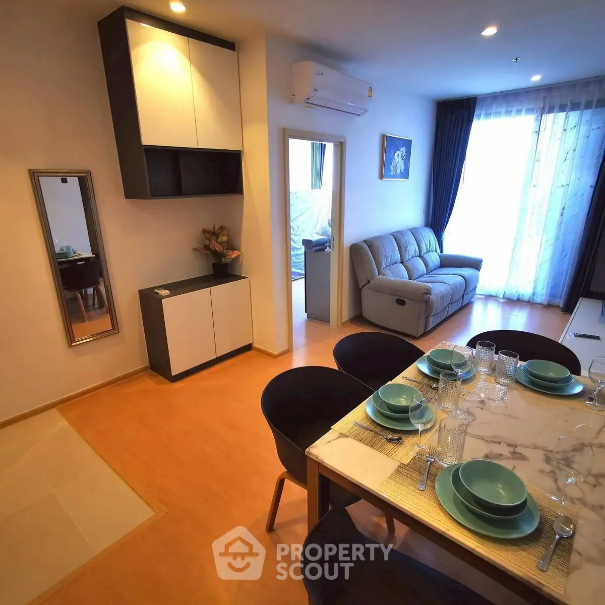 Modern living room with dining area and stylish decor