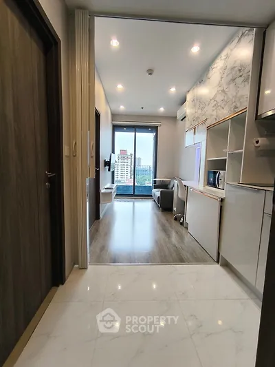 Modern apartment interior with open layout and city view balcony