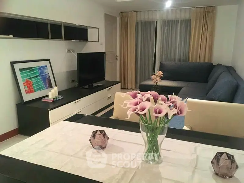 Modern living room with elegant decor and cozy seating area