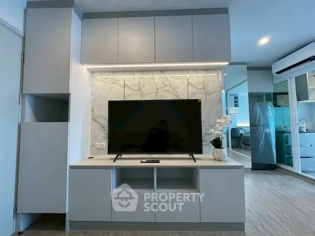 Modern living room with sleek TV unit and stylish decor