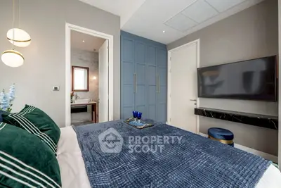 Luxurious bedroom with modern decor and ensuite bathroom