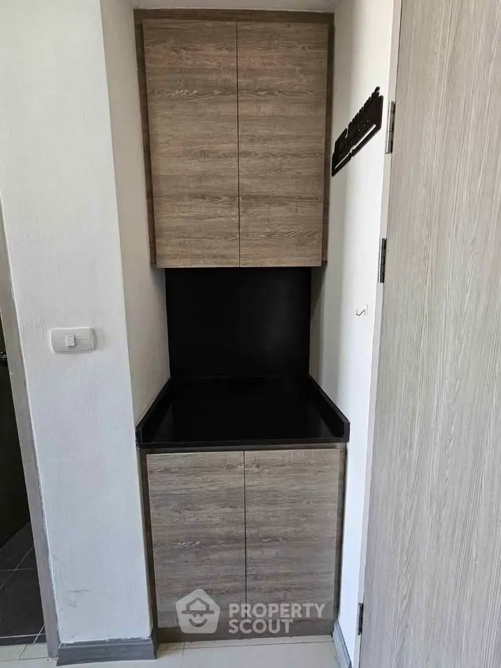 Modern storage cabinet with sleek wooden finish in compact space