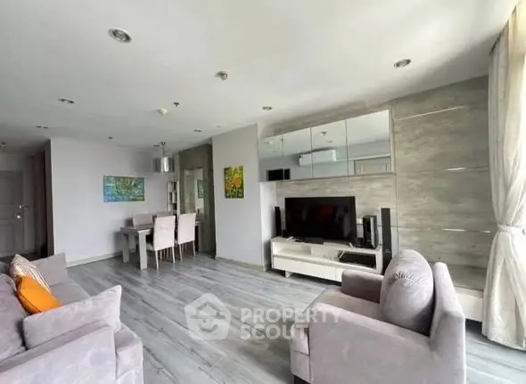 Spacious modern living room with elegant decor and ample natural light