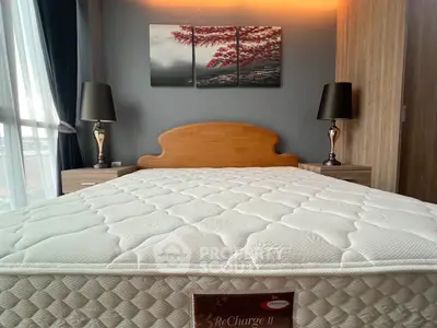 Modern bedroom with stylish decor and comfortable mattress in a cozy setting.