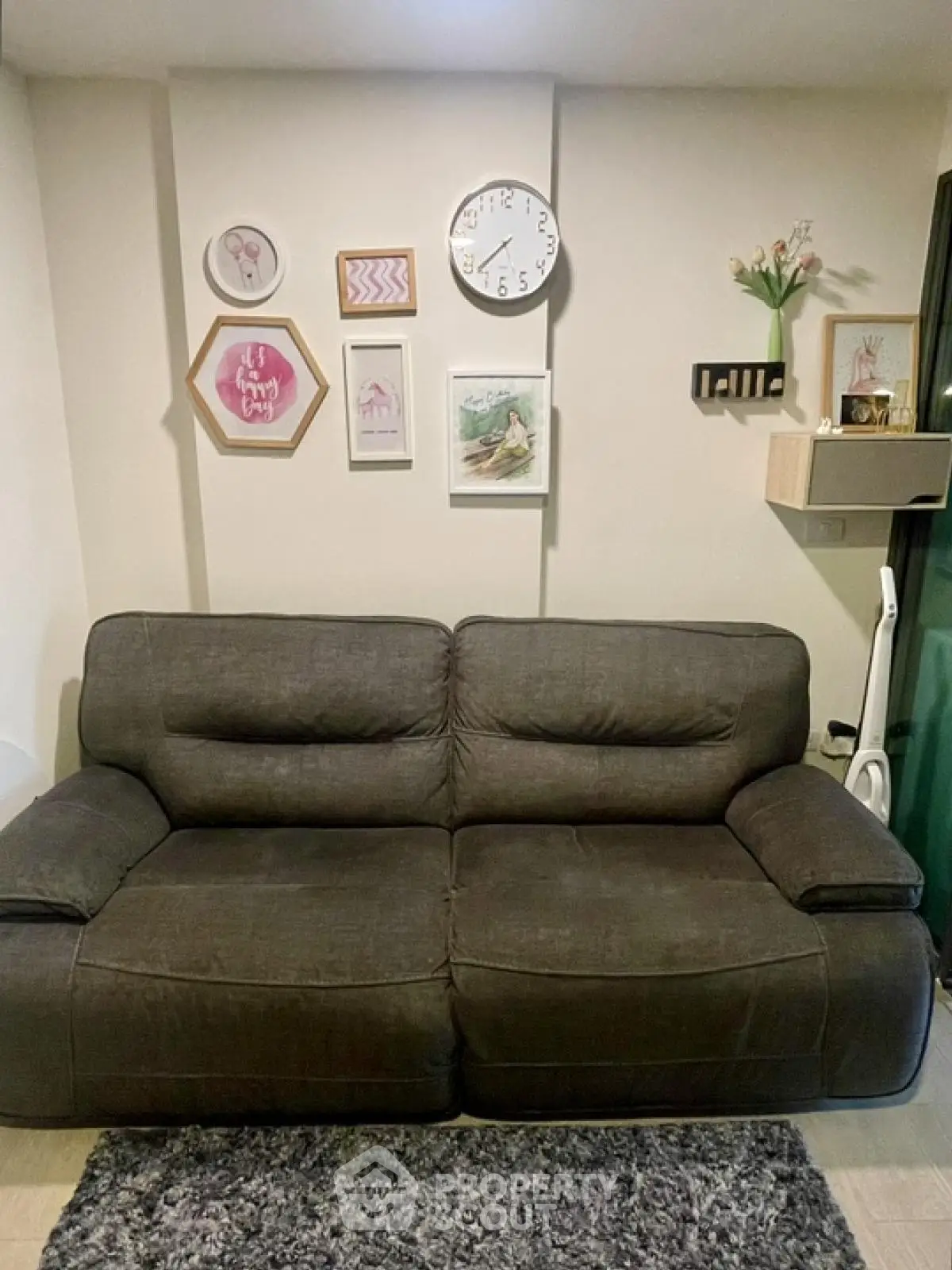 Cozy living room with stylish decor and comfortable sofa