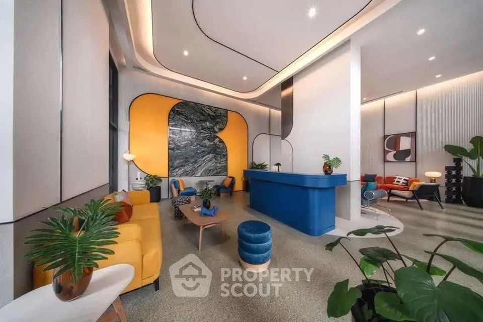 Stunning modern living room with vibrant colors and stylish decor, featuring unique architectural design and cozy seating.
