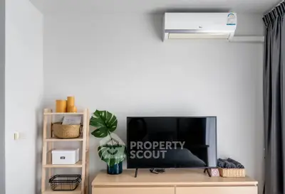 Modern living room with air conditioning and stylish decor