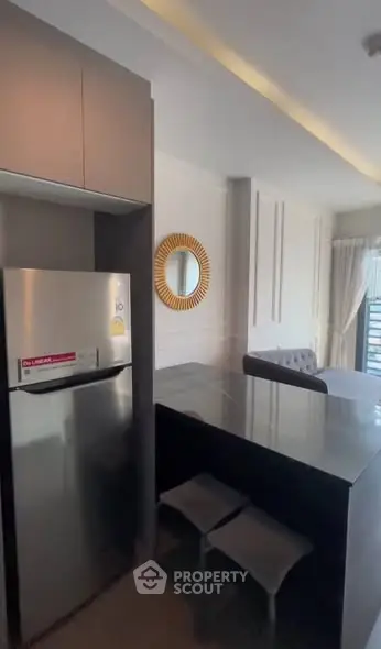 Modern kitchen with sleek design and stainless steel appliances