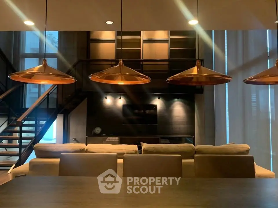 Luxurious modern living room with stylish lighting and mezzanine level