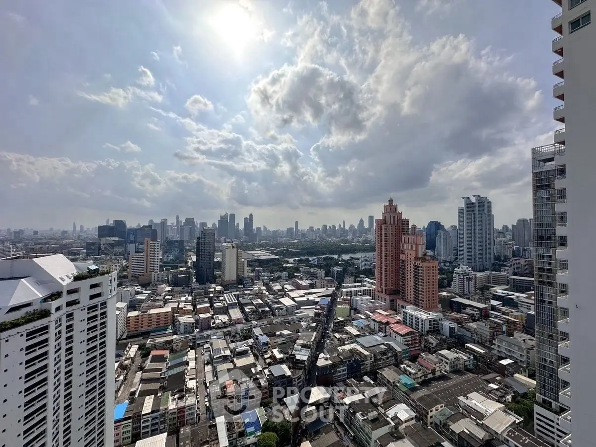 Stunning cityscape view from high-rise building showcasing urban skyline and vibrant architecture.