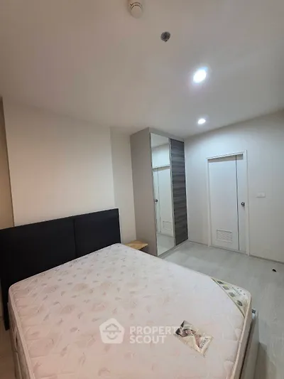Modern bedroom with minimalist design and spacious wardrobe