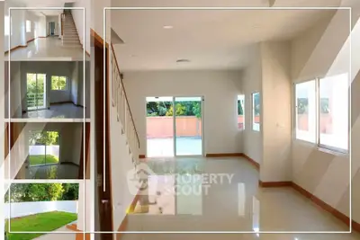 Spacious modern living room with large windows and garden view