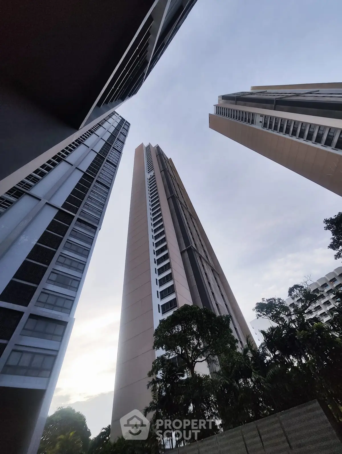 Stunning architectural view of modern high-rise buildings against a serene sky.