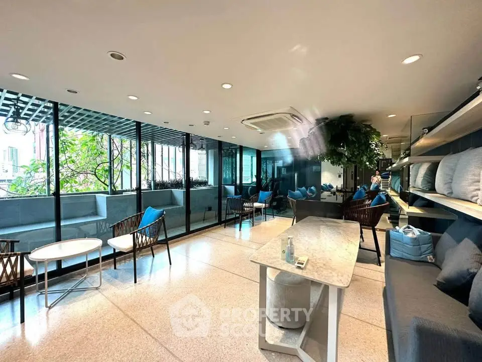 Modern co-working space with stylish seating and natural light