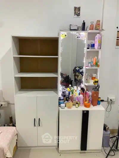 Modern bedroom storage with shelves and vanity mirror, perfect for organizing essentials.