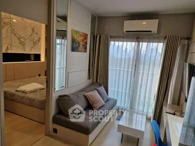 Modern compact living room with city view, featuring cozy sofa, air conditioning, and stylish decor.