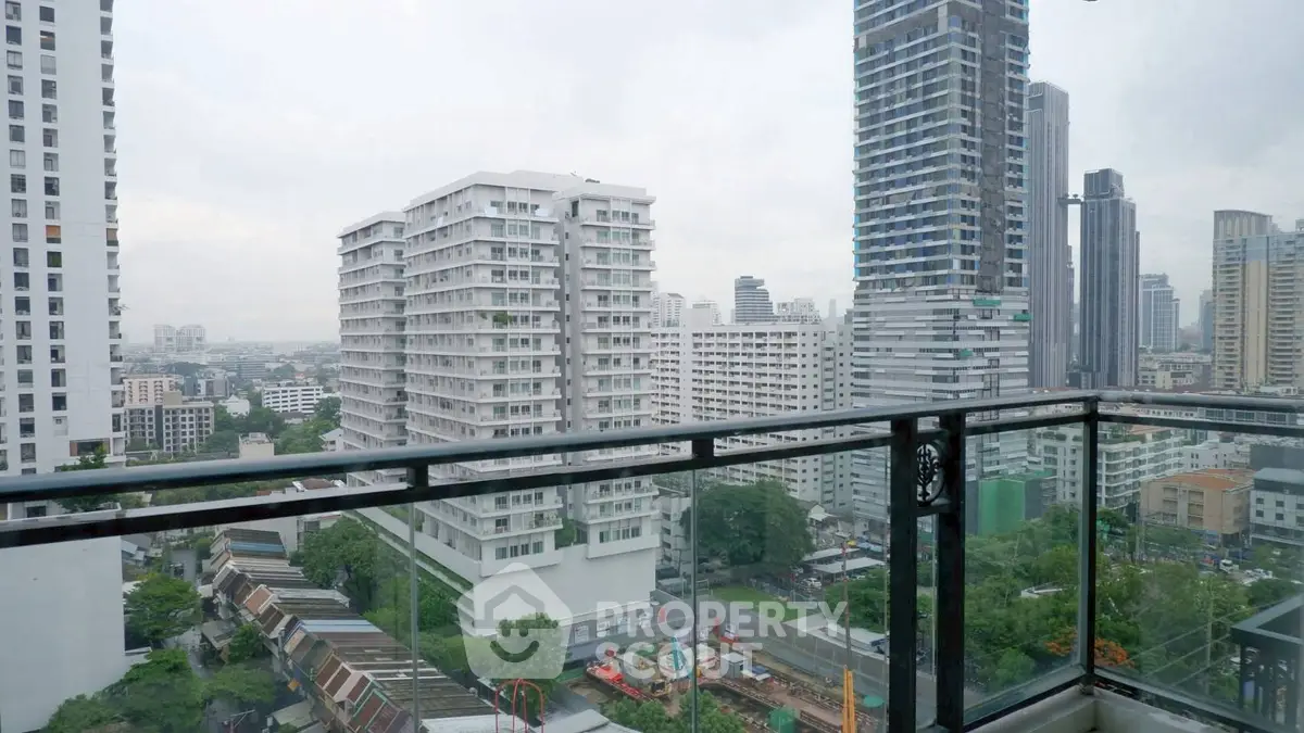 Stunning cityscape view from modern high-rise balcony