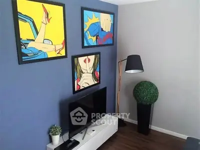 Stylish living room with pop art decor and modern furnishings, perfect for contemporary living.