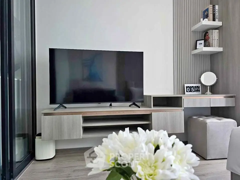 Modern living room with sleek TV unit and stylish decor, perfect for contemporary living.