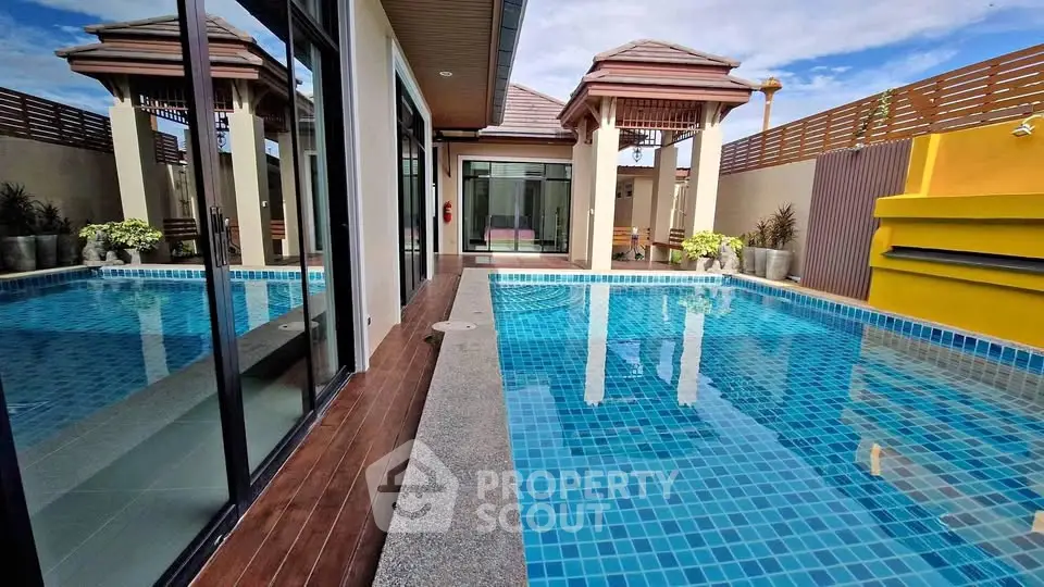 Luxurious private pool area with modern architecture and serene ambiance, perfect for relaxation and entertainment.