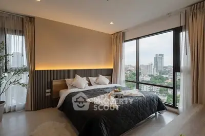 Luxurious bedroom with panoramic city view and elegant decor
