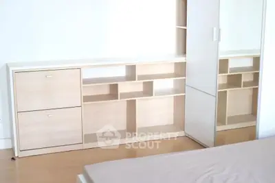 Modern bedroom with sleek storage solutions and minimalist design