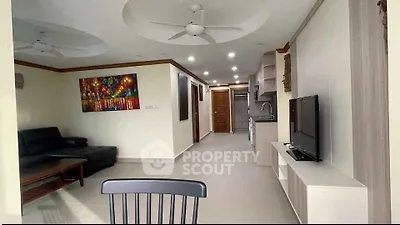 Spacious modern living room with sleek furniture and open layout