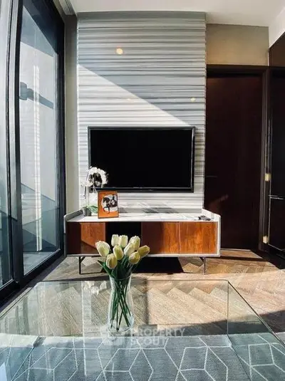 Modern living room with stylish TV setup and elegant decor