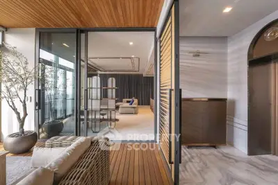 Luxurious modern living room with wooden accents and elegant decor