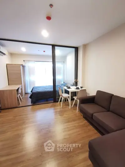 Modern studio apartment with open layout and stylish furnishings