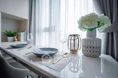 Elegant dining area with modern decor and natural light