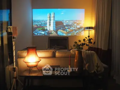 Cozy living room with stylish decor and cityscape projection on wall.